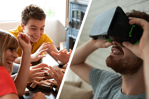 Analog spielende Menschen und ein Mann mit einer VR-Brille